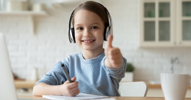 A young child doing educational courses online
