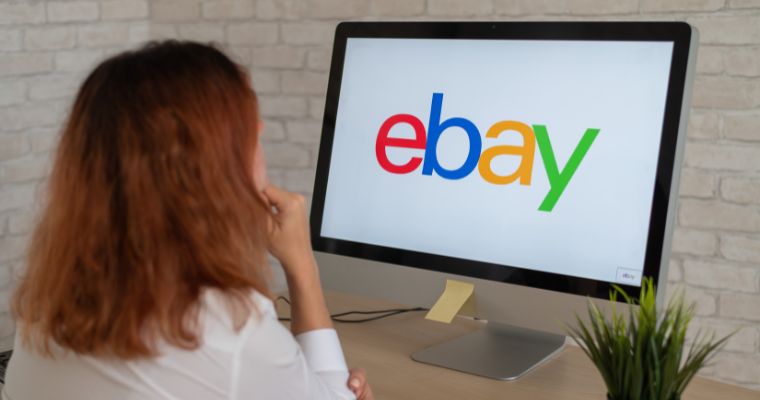 A woman looking at the eBay site